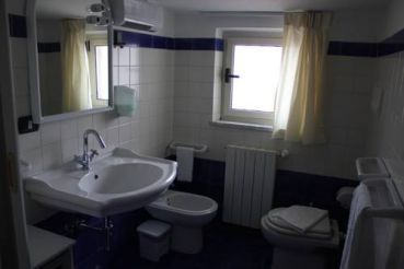 Двухместный номер с 1 кроватью или 2 отдельными кроватями и cобственной внешней ванной комнатой