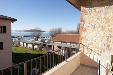 One-Bedroom Apartment with Balcony and Lake View
