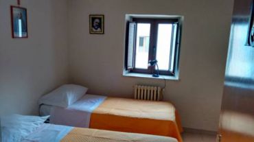 Двухместный номер с 2 отдельными кроватями, общей ванной комнатой и видом на сад
